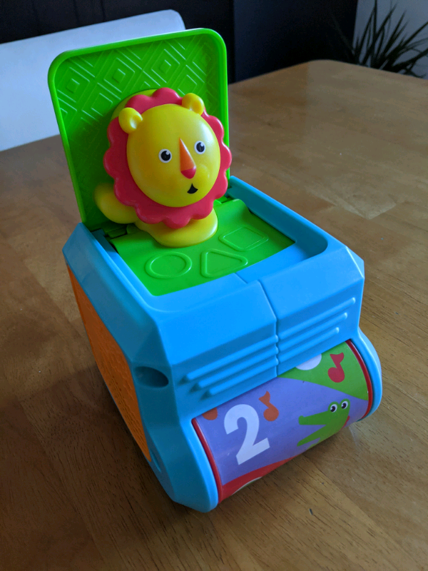 fisher price spin and surprise lion